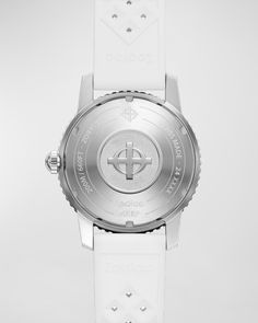 ZODIAC "Compression Diver II" men's watch    40mm; round stainless steel case    Sapphire crystal glass    Automatic analog display    Matte white dial    Logo at 12 o'clock    Date window at 3 o'clock    Branded white rubber strap    Water resistant up to 200m    Automatic movement    Suitable for professional marine activity and serious surface water sports, but not diving    Spot clean    Made in Switzerland White Watch Accessories With Date Indicator And Round Dial, Modern White Watch Accessories With Date Indicator, White Chronometer Round Watch, White Chronometer Watch, Modern White Watches With Date Indicator, Modern White Chronograph Watch Accessories, Timeless White Watch Accessories With Round Dial, Timeless White Round Dial Watch Accessories, White Automatic Timeless Watch