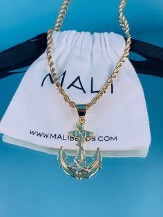 "18kt Gold Filled 2.5mm Rope Chain Necklace with Large Anchor Pendant Charm can slide on and off chain so the chain can also be used without the pendant. Tarnish resistant, Hypoallergenic Different sizes available below. 16\",18\" is generally used for kids or women. 24\" or 26\" would be ideal for men. Chain Length: Options available. Chains can vary by .5\". Model is wearing a 18\" Material: 18 Karat Gold Filled, Hypoallergenic. Tarnish Resistant. Gold-filled does not de-laminate or peel like Gold Anchor Necklace In Nautical Style, Gold Nautical Anchor Necklace, Gold Nautical Anchor Jewelry, Nautical Anchor Shaped Gold Jewelry, Nautical Anchor Gold Jewelry, Nautical Anchor-shaped Gold Jewelry, Nautical Style Anchor Gold Jewelry, Anchor Rope, Men Chain