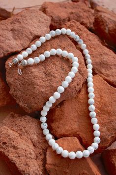 "Natural white buffalo howlite & sterling necklace. Made by native artisan. Gorgeous white buffalo beads (howlite) w/sterling hook and eye and native sterling bead at the end. -different sizes available 16\"-24\" -8mm beads -has native stamped sterling beads at the end Please note- the earrings in the picture match the necklace beautifully and are available to purchase separately. Here is a link to them- https://www.etsy.com/listing/667527971/mindfulness-gift-gemstone-earrings?ref=related-7 White Bead Necklace, Southwestern Necklace, White Beaded Necklaces, Inlay Jewelry, White Buffalo Turquoise, Lapis Pendant, Lapis Lazuli Pendant, Native American Turquoise, Sterling Necklaces