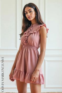 Olivia Mark - Ruffled Elegance Smocked Waist Mini Dress in Blush Pink Feminine Smocked Dress With Ruffle Hem And Sleeves, Fitted Smocked Dress With Ruffle Sleeves And Details, Feminine Smocked Mini Dress With Ruffle Hem, Elegant Smocked Dress With Ruffle Sleeves For Spring, Elegant Smocked Dress With Ruffle Hem And Sleeves, Elegant Ruffle Sleeve Smocked Spring Dress, Elegant Spring Ruffle Dress With Smocked Back, Elegant Ruffle Dress With Smocked Back For Spring, Knee-length Smocked Dress With Ruffles