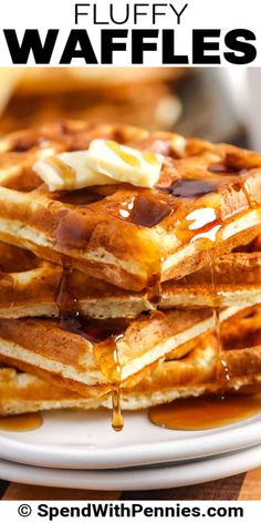 stack of fluffy waffles with syrup and butter drizzled on top