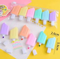 several ice cream popsicles are lined up on a yellow and pink background with the words, highlighter