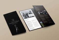 an open brochure with black and white images on it, sitting next to another brochure