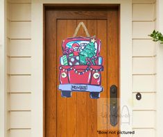 a wooden door with a christmas card on it