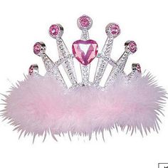 a tiara with pink feathers and jewels