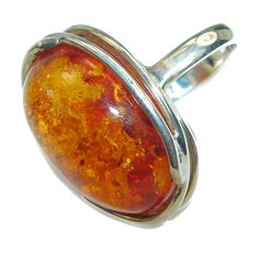 Handmade Unique 925 Sterling Silver ring with unique one of a kind Amber,  11.50 grams of marvelous handcrafted jewelry design. Only one piece availble ready to ship! It's unique worldwide ring - simply piece of art in world of fine jewelry. Authentic  Baltic Amber   .925 Sterling Silver handcrafted  ring; s. 8 adjustable  RING DETAILS: Weight: 11.50g; Size: 8 -adjustable; Material: Sterling Silver; Main stone: Amber; Dimension: L - 1, W - 3/4, T - 1/2 inch; Stamp / Mark: 925; Condition: New; Ma Adjustable Sterling Silver Rings In Amber, Adjustable Sterling Silver Ring With Amber Color, Adjustable Sterling Silver Amber Ring, Adjustable Amber Cabochon Rings, Adjustable Oval Amber Ring, Adjustable Amber Open Ring Jewelry, Adjustable Amber Ring Jewelry, Adjustable Amber Jewelry With Polished Finish, Unique Silver Jewelry