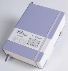 a purple and white notebook with the word 350 pages printed on it's side