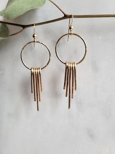 Super fun Hoop Fringe Earrings. You have a choice between Sterling Silver or 14 K Gold Filled. Each piece of the fringe is hand formed and hammered for texture and shine. The hoop is hammered as well. The earrings hang down approx. 2 in. My commitment to you: I hand make each of my products and hand pick all of the materials that I use in my pieces. Each piece may vary slightly due to the fact that it is handmade but that is what makes your piece so special! I don't take it lightly that you are Creative Fashion Photography, Silver Circle Earrings, The Fringe, Wire Earrings, Fringe Earrings, Jewelry Business, Circle Earrings, Creative Fashion, Wire Wrap