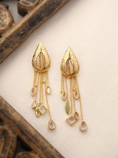 * It's dainty and can be worn every day * A special piece you'll treasure * High-quality materials and attention to detail Elegant Brass Danglers For Festivals, Elegant Danglers With Latkans For Reception, Festive Brass Drop Earrings Danglers, Elegant Meenakari Dangle Danglers, Festive Brass Drop Earrings, Festive Brass Drop Danglers, Elegant Brass Dangle Jhumkas, Elegant Brass Danglers For Diwali, Meenakari Gold Plated Earrings For Party