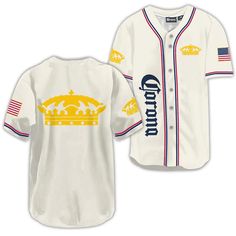 a baseball jersey with the crown on it and an american flag in the back ground