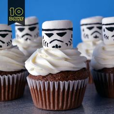 star wars cupcakes with white frosting and faces on them