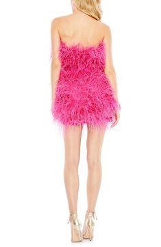 Fully and festively commit to the feather trend in a joyful mini that will get glasses raised. 35" length Hidden back-zip closure Strapless Attached sash Lined 100% polyester with ostrich-feather trim Spot clean Imported Asian Owned/Founded Pink Feather Dress, Embellished Fabric, Mode Rose, Plastic Dress, Satin Sash, Dress Guide, Unique Prom Dresses, Column Dress, Feather Dress