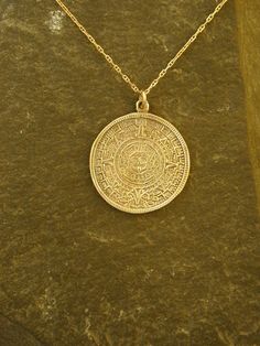 "This solid Aztec Calendar Stone pendant is 14K Gold. The included chain is a 14K Gold chain. You may chose 16, 18 or 20 inch at the same price. Other length available at sightly higher prices. The Aztec Calendar Stone pendant measures 15/16\" in diameter. I hand cast all my pieces using the lost wax casting method. Please ask your needs. You may call me with questions, often I am out so please use my machine. 831-476-3176. Satisfaction Guaranteed! I send items USPS First Class unless otherwise Aztec Symbols, Queens Jewels, Aztec Calendar, Wax Casting, Lost Wax Casting, Jewel Box, Lost Wax, Hand Cast, Stone Pendant