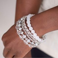 Infused With Silver Accents, A Glassy Collection Of White And Metallic Crystal-Like Beads Are Threaded Along Stretchy Bands Around The Wrist For A Whimsically Layered Look. Sold As One Set Of Six Bracelets. Stretchy Bracelets, Silver Accents, Paparazzi Jewelry, Layered Look, White Beads, Bracelet Set, Womens Jewelry Bracelets, Beaded Jewelry, Beaded Bracelets