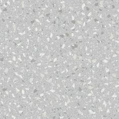 a gray and white speckled surface with small dots