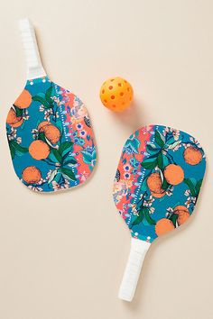 Serving summer’s brightest patterns, these pickleball paddles are a smash. The cute designs are sure to make you dink. Inspired by the mountains, flora, and fauna of Ojai, California, Alexandra Farmer's latest collection combines her love for the British Arts & Crafts Movement with the beauty that nature provides. | The Flock Pickleball Set by Alexandra Farmer in Orange, Polyester/Cotton at Anthropologie Company Swag, Orange Fits, Outdoor Gifts, Candles For Sale, Bright Patterns, Pickleball Paddles, Old Money Aesthetic, Pretty Prints, Summer Gift