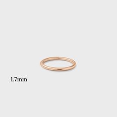 A classic band that goes perfectly with any engagement ring and is a great addition to any stack! Classic Yellow Gold Stackable Halo Rings, Classic Everyday Halo Rings, Classic Yellow Gold Stackable Rings With Simple Design, 14k Rose Gold Stackable Rings, 14k Rose Gold Midi Rings With Round Band, Minimalist 14k Rose Gold Round Band Ring, Rose Gold Stackable Rings With Halo, Rose Gold Halo Stackable Rings, Timeless Rose Gold Stackable Wedding Rings