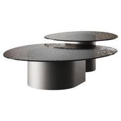 two circular tables sitting on top of each other