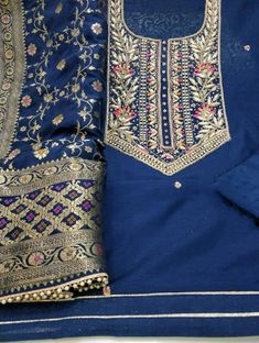 Item Overview ATHARVA Hand Embroidery Salwar Kameez/Navy Blue Chanderi Silk/Banarsi Silk Meenakari Dupatta/Custom Stitch Unstitch/Patiala/Anarkali/Gift Dno. CH1689 Fabric: * Shirt - Chanderi Silk- Hand Embroidered Neck - Red- 2.5 Mts - Beautiful Hand Embroidery * Dupatta: Banarsi Dola Silk Meenakari Dupatta- 2.5 Mts- Latkans Tassels * Bottom Santoon Silk 2.5 Mts. Heavy Quality/ Stitched without lining Excusive Hand Embroidered Party Wear Punjabi Suit. Customization: * Fabrics Customization: Desi Indigo Chanderi Salwar Kameez With Zari Work, Indigo Anarkali Traditional Wear With Dupatta, Festive Indigo Anarkali Set With Dupatta, Traditional Indigo Semi-stitched Kurta, Traditional Semi-stitched Indigo Kurta, Indigo Salwar Kameez With Resham Embroidery, Traditional Indigo Sets With Dupatta, Indigo Chanderi Traditional Wear For Wedding, Festive Indigo Chanderi Traditional Wear