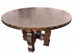 a round wooden table with metal studs on the top and bottom, against a white background