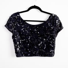 Black Sequin Crop Top. Never Worn, New With Tag. Black Sequined Summer Blouse, Black Short Sleeve Party Blouse, Fitted Black Blouse With Sequins, Black Summer Festive Blouse, Black Festive Blouse For Summer, Festive Black Blouse For Summer, Black Sequin Crop Top, Sequin Crop Top, Tops Black