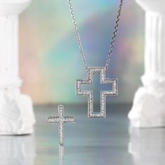 A deep and devoted connection to faith is something to honor. Express loyalty with a magnificent cross pendant. The unique design of the iconic cross is especially captivating. The jewel has two crosses one inside the other, joined by a silver chain. Crafted in sterling silver, each traditional cross is outlined with a glittering array of shimmering stones, while the edges are a sophisticated touch. Modern cross pendants that can be combined into one breathtaking cross pendant. Can be worn 3 dif Luxury Cross Necklace For Anniversary, Luxury Sterling Silver Cross Necklace, The Jewel, Modern Cross, Sterling Silver Necklace, Cross Pendant, Sterling Silver Necklaces, Silver Chain, Unique Design