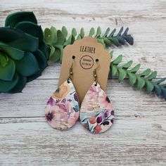 "These small cork and leather teardrop petal earrings make a great statement, yet simple and easy for everyday wear.  They are made with cork on the front and leather on the back, which gives them a firm feel and structure.  They feature flowers in colors of purple, yellow, pink, blue and green. They are lightweight and sure to pair perfectly with any outfit!  They also make great gifts for moms, daughters, grandmothers, sisters, friends, teachers, coworkers, and more! *Size = Small = 2\" long x 1.25\" wide with a drop length of 2.5\" *Thickness = 1.2mm = thick* *pattern will vary slightly from what is in the photo* *last photo shows other styles and sizes listed elsewhere in the store - these are the Small Teardrop* > Durable > Noise free > Affordable > Nickel free fishhook ear wire > Rub Spring Adjustable Teardrop Earrings, Spring Gift Teardrop Dangle Earrings, Spring Teardrop Earrings As A Gift, Petal Earrings, Gifts For Moms, Rose Bleu, Earrings Colorful, Great Gifts For Mom, Colorful Jewelry