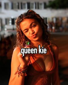 an image of a woman with the caption queen kie