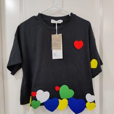 New With Tag Size: L ( Run Small, Fits 110 Lb To 132 Lb, If You Usually Wear Size M, That Will Fit Perfectly) Fabric: Cotton Heart: Felt Fabric Measurement: - Shoulder: 22 Inches -Length: 20.5 Inches Casual Black T-shirt With Heart Shape, Casual Black Heart-shaped T-shirt, Black Heart-shaped Casual T-shirt, Black Casual Heart-shaped T-shirt, Black Short Sleeve T-shirt With Heart Print, Multicolor Heart Print Crew Neck Top, Black Heart Print Top For Spring, Spring Black Top With Heart Print, Black Heart Print T-shirt For Spring