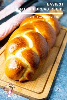 a loaf of bread sitting on top of a cutting board