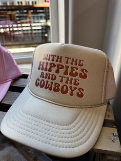 Tab trucker hat that says, "With the hippies and the cowboys". Trucker Cap, Windsor, Festival Season, Caps Hats, Trucker Hat, Accessories Hats, Cowboy, Bathing Beauties, Accessory Gift