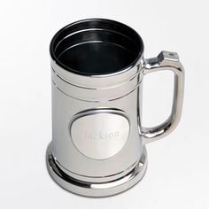 a stainless steel mug with the word jackson engraved on it's front and sides