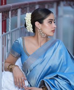 The floral accents add a touch of natural beauty, making it an ideal choice for brides or bridesmaids. Feeling like a princess in blue dress with this stunning hairstyle, ready to dance the night away! भारतीय दुल्हन संबंधी, Indian Dress Up, Simple Saree Designs, Fashionable Saree Blouse Designs, Janhvi Kapoor, Fancy Sarees Party Wear, South Indian Sarees, Bollywood Outfits, Desi Fashion Casual