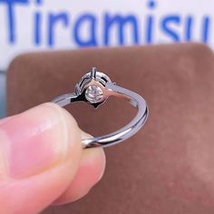 ❤ Moissanite Ring Basic Information ❀It is 100% handmade. ❀It is cut and polished by professional craftsman. ❀Center Stone is a delicate round moissanite. ❤ Moissanite Details ❀ Stone Weight: 0.5 Ct ❀ Measurement: 5.0 mm ❀ Stone Weight: 1.0 Ct ❀ Measurement: 6.5 mm ❀ Stone Weight: 2.0 Ct ❀ Measurement: 8.0 mm ❀ Stone Clarity: VVS1 ❀ Stone Shape: Round Cut ❀ Stone Color: D Colorless ❀ Stone Make: Great Quality ❀ Band color Gold is made in 18K Gold plated sterling silver. ❀ Band color Rose gold in Silver Moissanite Wedding Ring With Tension Setting, Minimalist Moissanite Diamond Ring As Gift, Minimalist Moissanite Diamond Ring Gift, Minimalist Moissanite Ring For Gift, Minimalist Moissanite Ring As Gift, Minimalist Moissanite Ring Gift, White Gold Diamond Ring With Tension Setting Gift, Diamond White Diamond Ring With Tension Setting, White Gold Moissanite Crystal Promise Ring