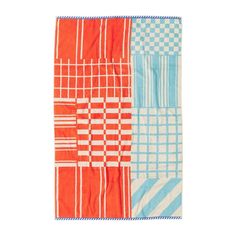 an orange and blue checkered towel on a white background, with the same pattern