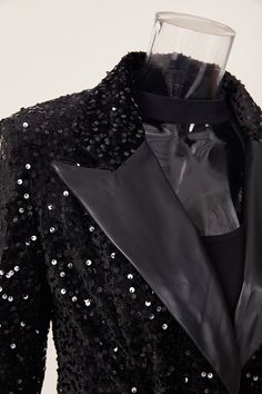 Expertly crafted with a PU Leather lapel and sequin embellishments, our Midnight Dream blazer exudes sophistication and style. The included up leather belt adds a touch of elegance, making this blazer perfect for any special occasion. Elevate your wardrobe with this must-have statement piece. Decoration Sequined Style Elegant Fabric Type Blended fabrics , Sequin , PU Material Polyester , Polyester Neckline Suit Collar Pattern Type Solid , Patchwork Sleeve Length Full Season Spring / Autumn , Winter Fabric Slight Stretch Luxury Lapel Collar Blazer For Night Out, Luxury Notch Lapel Blazer For Night Out, Fall Party Outerwear With Suit Collar, Luxury Evening Blazer For Fall, Elegant Outerwear With Sequins And Notch Lapel, Elegant Sequined Notch Lapel Outerwear, Formal Sequin Fall Blazer, Elegant Notch Lapel Outerwear With Sequins, Sequined Blazer For Formal Occasions In Fall