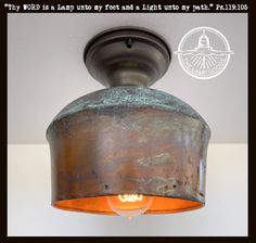 an old light fixture with the words, why world is a lamp post and a light up my ceiling?