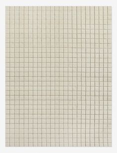 a white tile wall with small squares on the bottom and one square in the middle