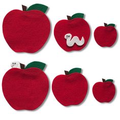 an apple, worm and apple felt appliques