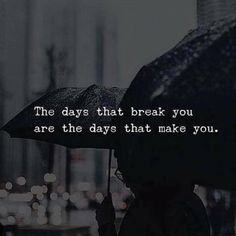 a person holding an umbrella with the words, the days that break you are the days that make you