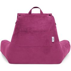 a pink backpack sitting on the ground