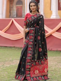 <ul>
<li style="text-align: justify;"><span data-preserver-spaces="true">Drape this elegance and rock your ethnicity with vichitra silk panetar saree in black and red contrast color in kachhi work embroidery with elephants, peacock motifs and contrast border with piping and thread lattkan.</span></li>
<li style="text-align: justify;"><span data-preserver-spaces="true">Beautified this panetar saree with contrast color red blouse with border sleeves.</s Black Blouse With Resham Embroidery For Festivals, Black Embroidered Blouse Piece For Festive Occasions, Festive Black Embroidered Blouse Piece, Festive Embroidered Black Blouse Piece, Traditional Black Choli With Motifs, Black Diwali Choli With Motifs, Black Dupatta With Intricate Embroidery For Navratri, Black Blouse With Resham Embroidery For Festive Occasions, Black Blouse With Zari Work In Traditional Drape