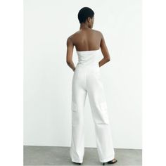 Zara White Jumpsuit Chic Strapless Summer Jumpsuit With Pockets, Chic Strapless Jumpsuit With Pockets For Summer, White Casual Strapless Jumpsuit For Party, Fitted High-waist Strapless Jumpsuit With Pockets, Fitted High Waist Strapless Jumpsuit With Pockets, Fitted Strapless Jumpsuit With Pockets For Spring, Casual Strapless Fitted Jumpsuit With Wide Legs, Chic White Strapless Jumpsuit For Summer, Fitted Strapless Jumpsuit With Pockets For Summer