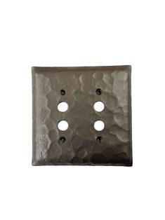 a metal plate with four holes in it