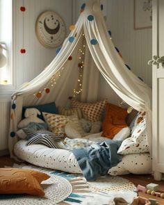 a child's bedroom with a canopy bed and toys on the floor in front of it