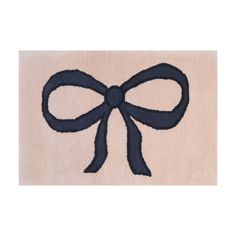 a black bow on a beige rug with blue ribbon around the edge and an invisible background