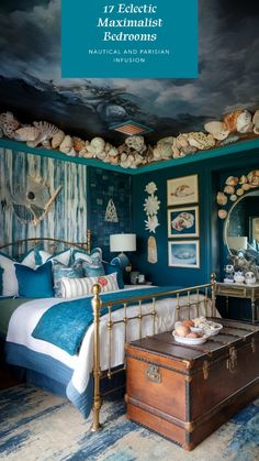 a bedroom decorated in blue and green with shells on the ceiling