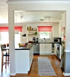 the kitchen is clean and ready to be used as a living room or dining area