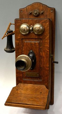 an old fashioned phone with two bells on it