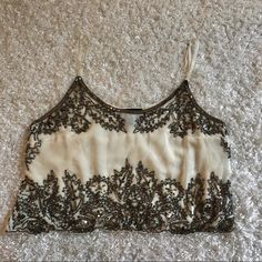 So Pretty! Would Look Great With A Skirt, Pants Or Even Jeans. Wear With A Blazer, Jean Jacket Or By Itself. A Versatile Staple For Your Closet! Nwot 18.5” Armpit To Armpit 14” Length 18.5” Length (With Strap As Long As It Can Go) Elegant Sleeveless Cream Crop Top, Glamorous Summer Festive Crop Top, Elegant Cream Crop Top For Spring, Elegant Sequined Crop Top For Summer, Cream Crop Top For Spring Party, Spring Party Cream Crop Top, Elegant Beige Sequined Tops, Glamorous White Sequined Crop Top, Cream Fitted Crop Top For Party